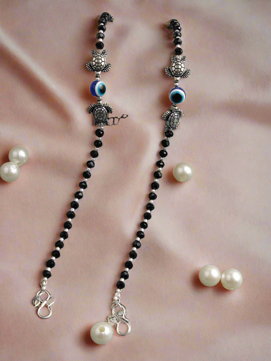 Jazz And Sizzle Set Of 2 Silver-Plated & Black Beaded Handcrafted Tortoise & Evil Eye Anklet