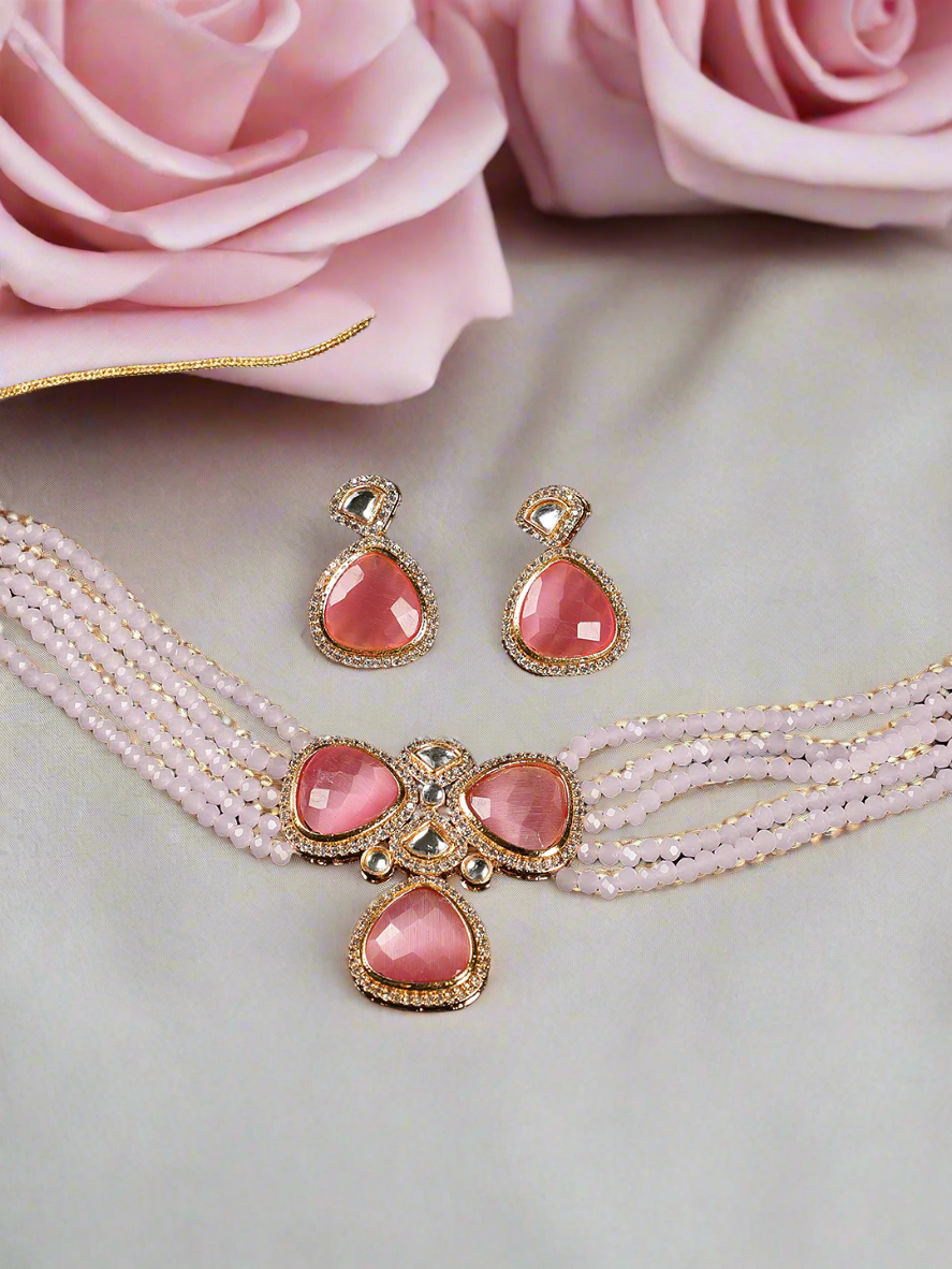 Jazz And Sizzle Gold Plated Peach Stone Studded & Pink Pearls Beaded Layered Necklace Set