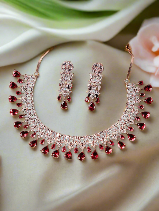 Jazz And Sizzle Maroon Stone Studded American Diamond Rose Gold Plated Jewelry Set