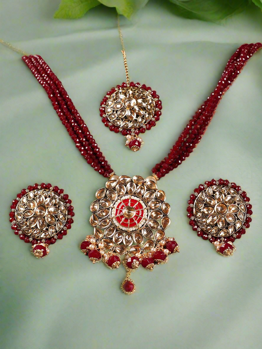 Gold-Plated & Kundan Studded Mahroon Beaded Multi-Strand Jewellery Set With Maangtika