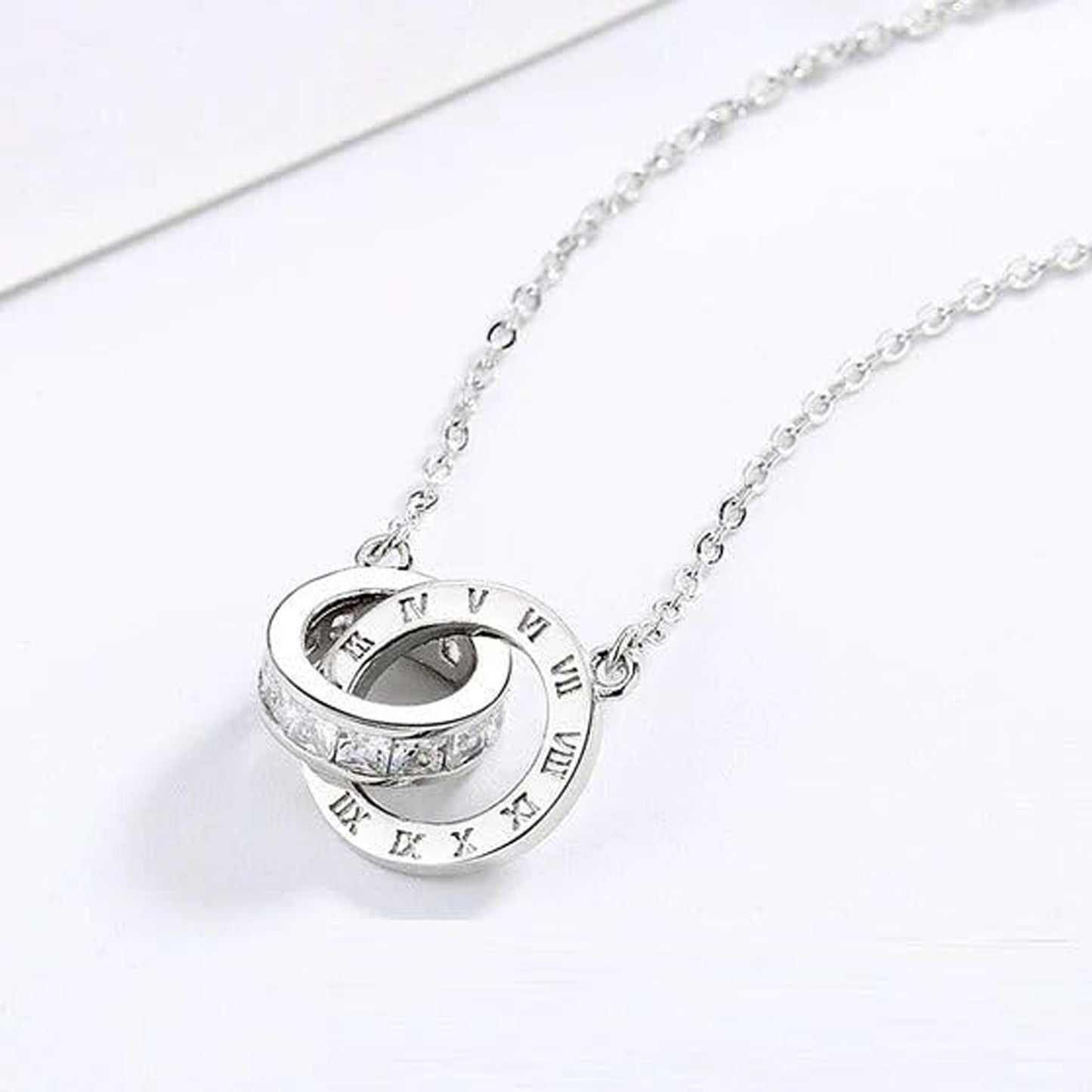 Jazz And Sizzle Silver Plated & Cubic Zirconia Interlocked Ring Design Pendant Chain Necklace for Valentines Gift