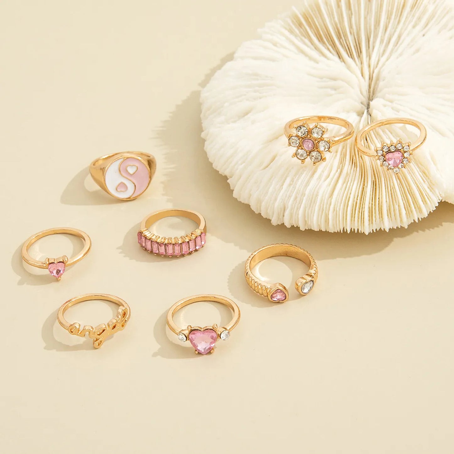 Jazz And Sizzle Set of 8 Pink Stone Studded & Gold Plated Finger Rings for Valentines Gift