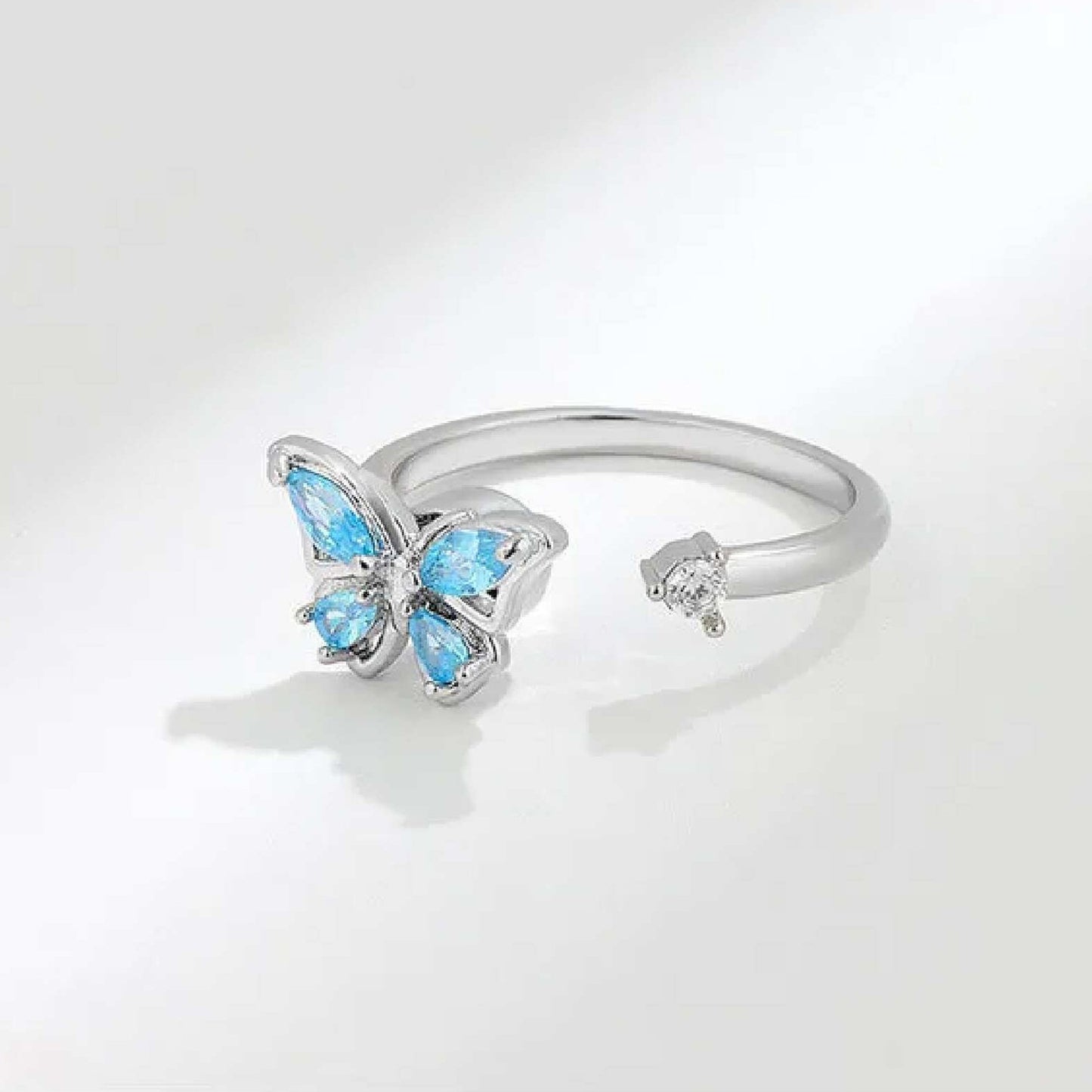 Jazz And Sizzle Silver Plated Blue Stone & Butterfly Shaped Ring for Valentines Gift