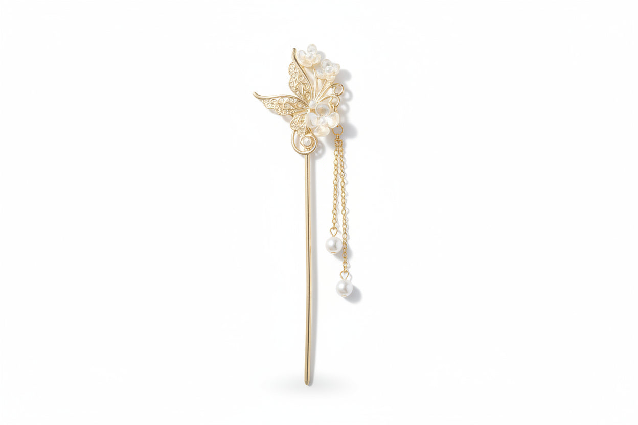 Gold hairpin with pearls and leaf design 

