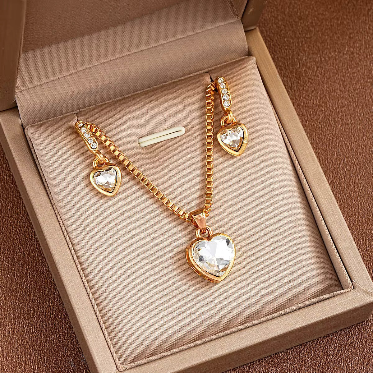 Jazz And Sizzle Gold Plated Heart Shaped Zircon Studded Necklace & Earrings Set