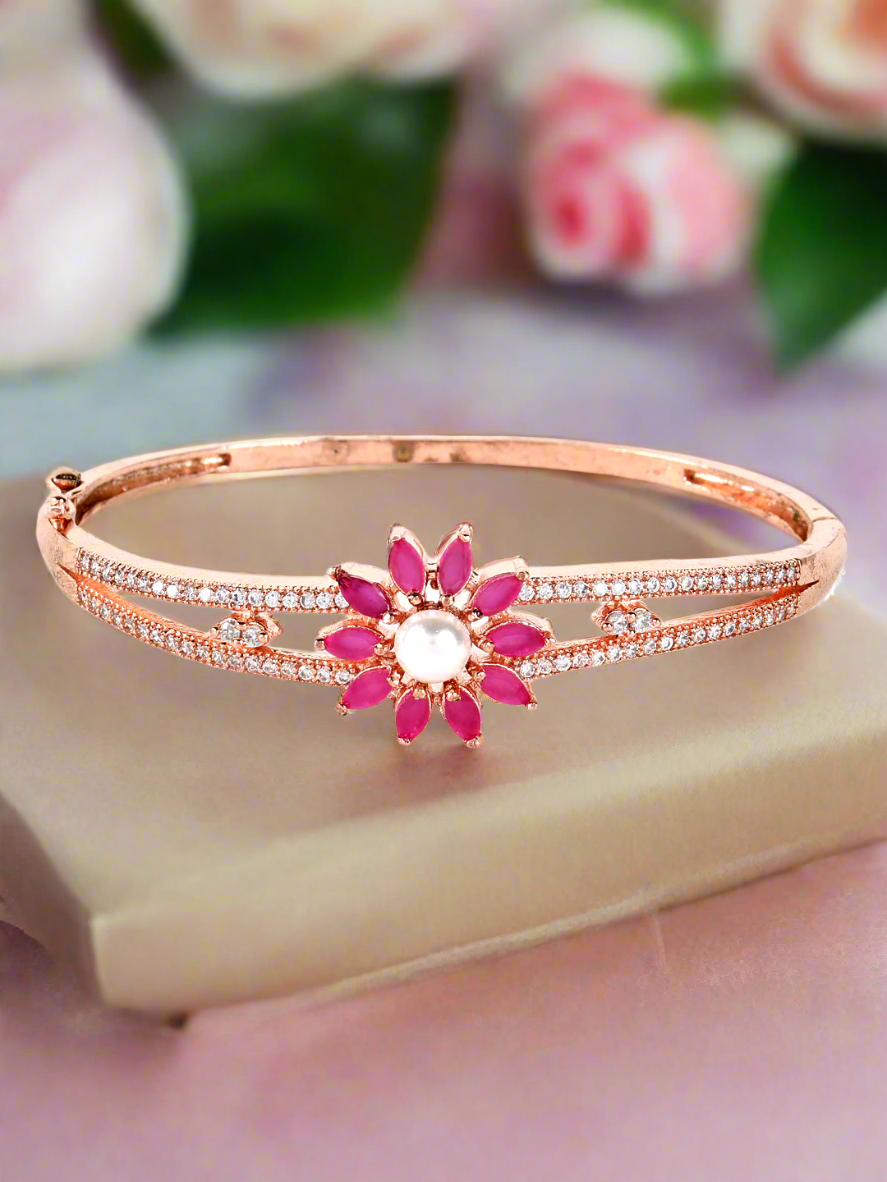 Jazz And Sizzle Rose Gold Plated American Diamond Ruby Studded Floral Patterned Bracelet