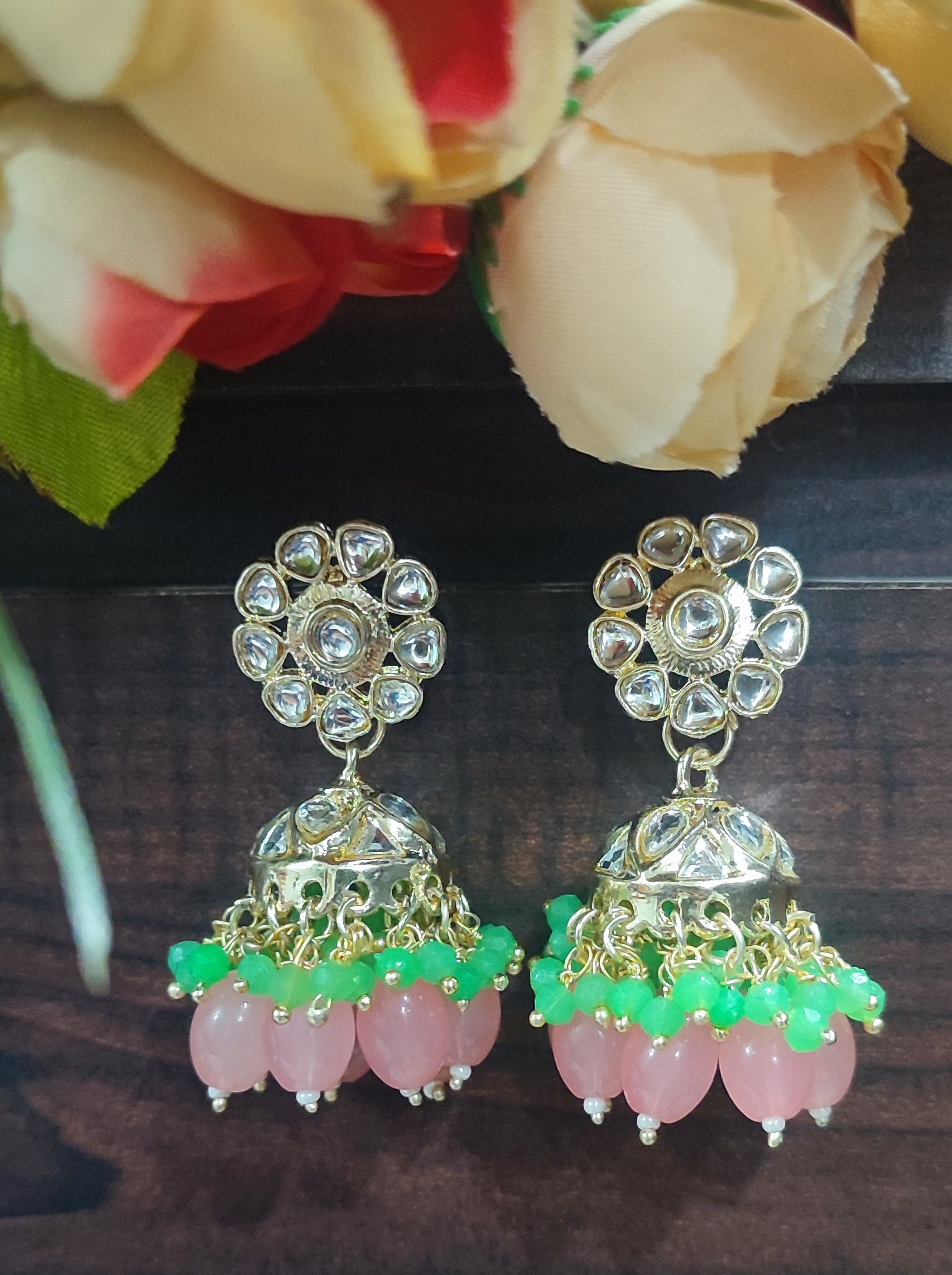 Jazz And Sizzle Gold Plated Pink &Green Pearl Beaded Kundan Studded Jhumka Earrings