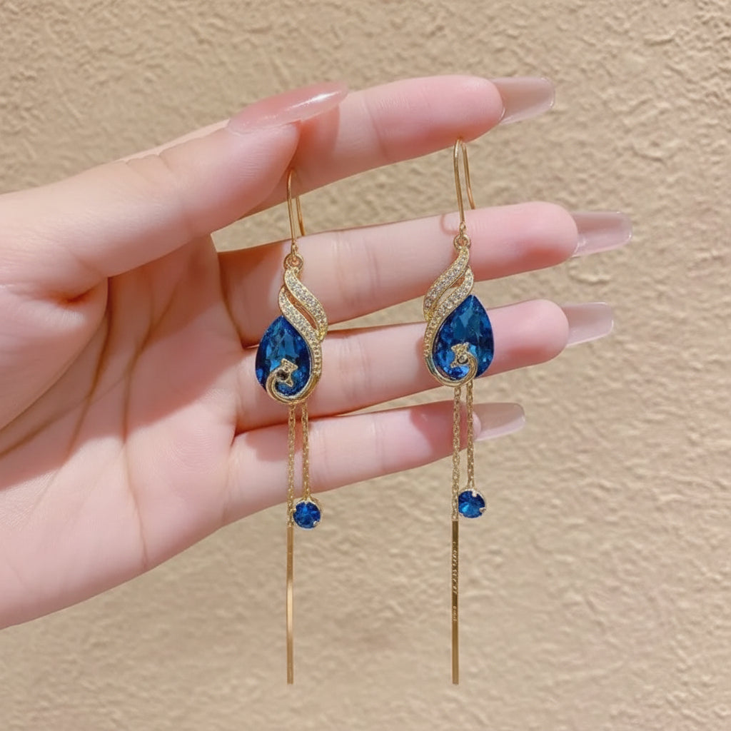 Jazz And Sizzle Gold Plated and Blue Stone Studded Long Danglers  Earrings