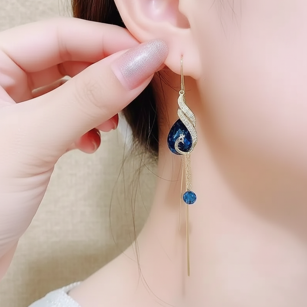 Jazz And Sizzle Gold Plated and Blue Stone Studded Long Danglers  Earrings