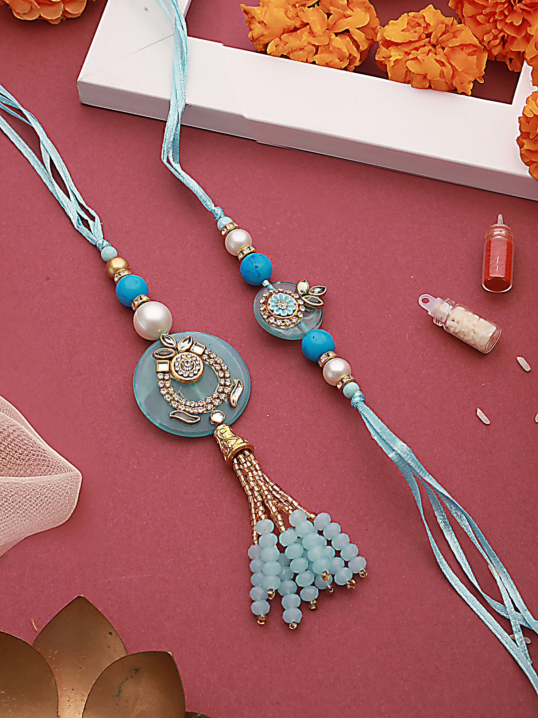 Jazz And Sizzle Set of 2 Crystal Studded & Pearl Tasseled Bhaiya Bhabhi Rakhi with Roli & Chawal