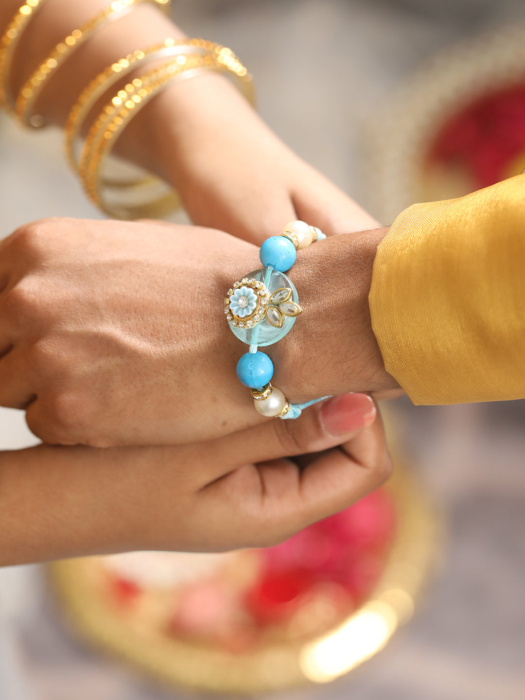 Jazz And Sizzle Set of 2 Crystal Studded & Pearl Tasseled Bhaiya Bhabhi Rakhi with Roli & Chawal