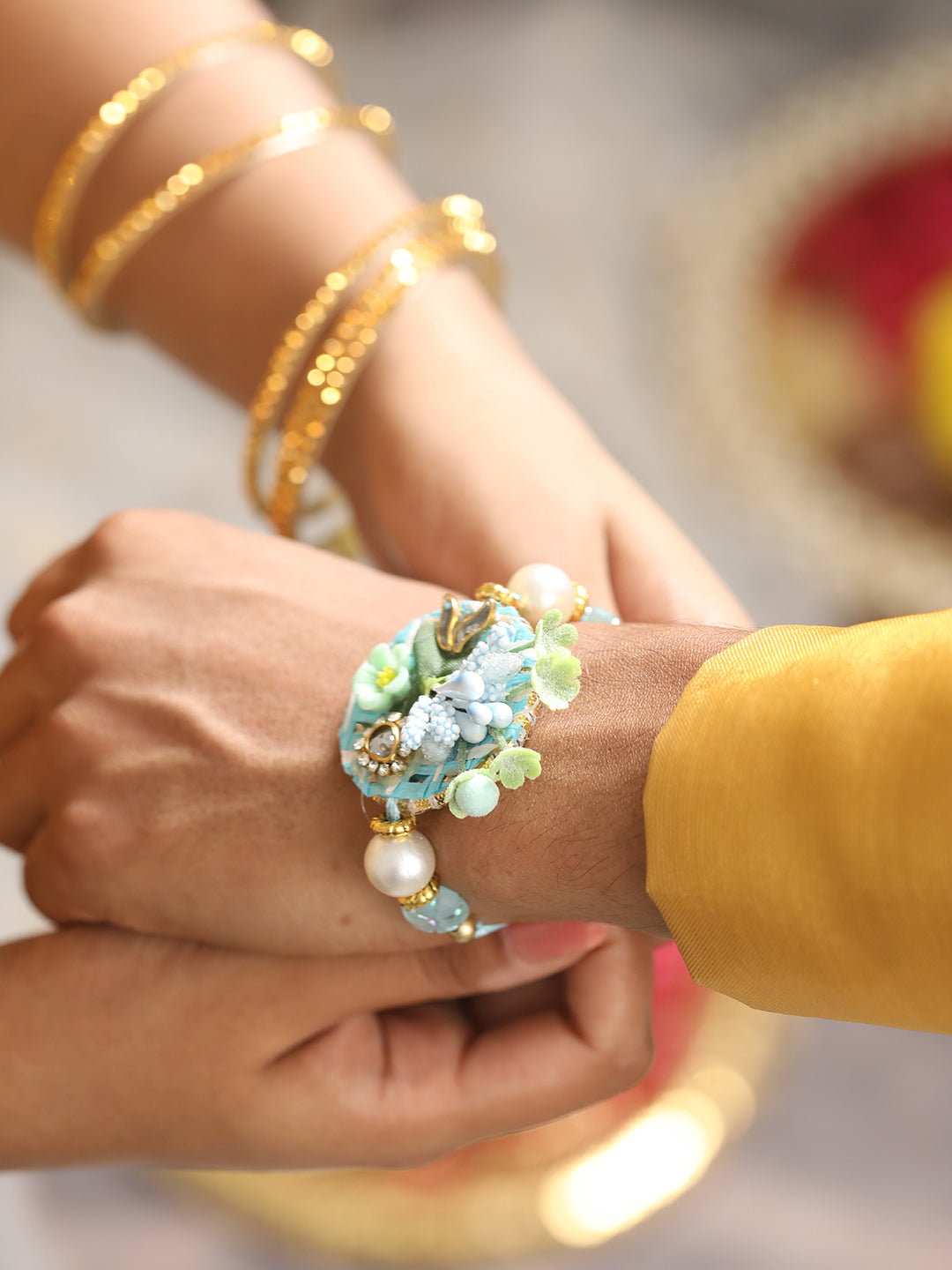 Jazz And Sizzle Set Of 2 Floral Work Tasseled Bhaiya Bhabhi Rakhi With Roli & Chawal