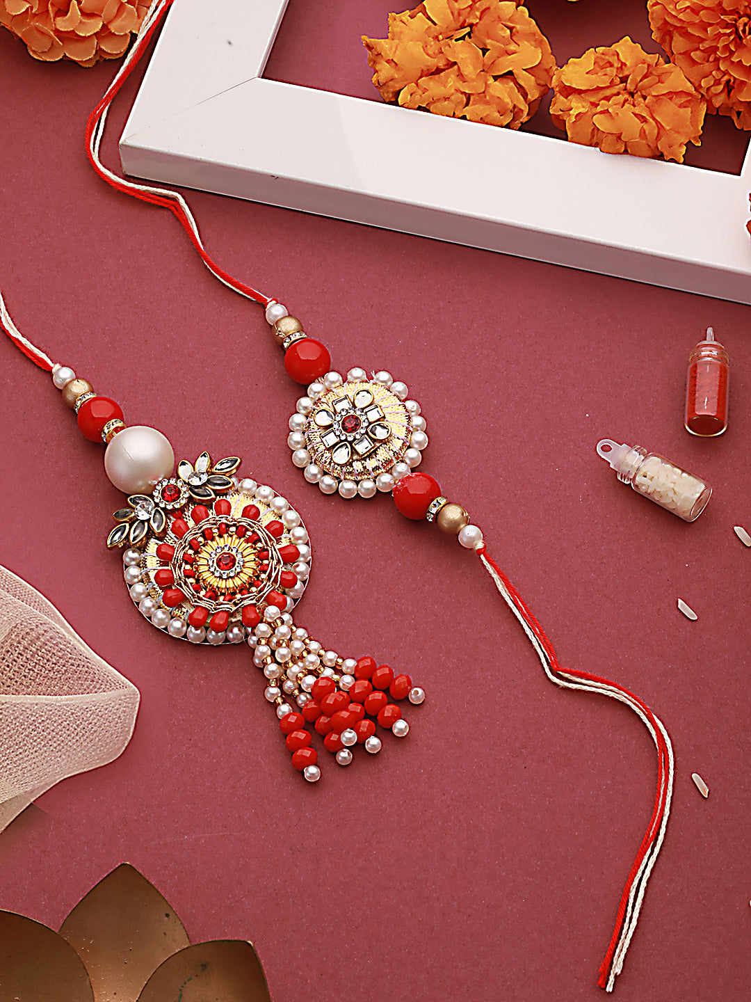 Set Of 2 Round Shaped Orange Kundan & Artificial Stone Studded Bhaiya Bhabhi Rakhi With Roli & Chawal