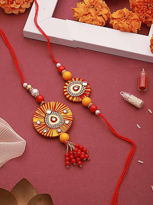 Set Of 2 Round Shaped Orange Kundan & Pearl Beaded Bhaiya Bhabhi Rakhi With Roli & Chawal