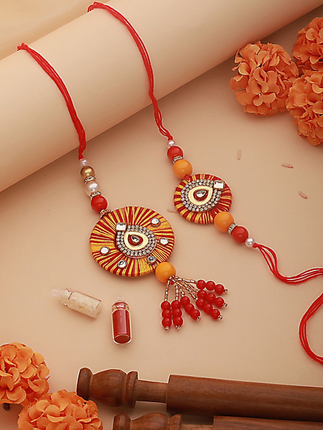 Jazz And Sizzle Set Of 2 Round Shaped Orange Kundan & Pearl Beaded Bhaiya Bhabhi Rakhi