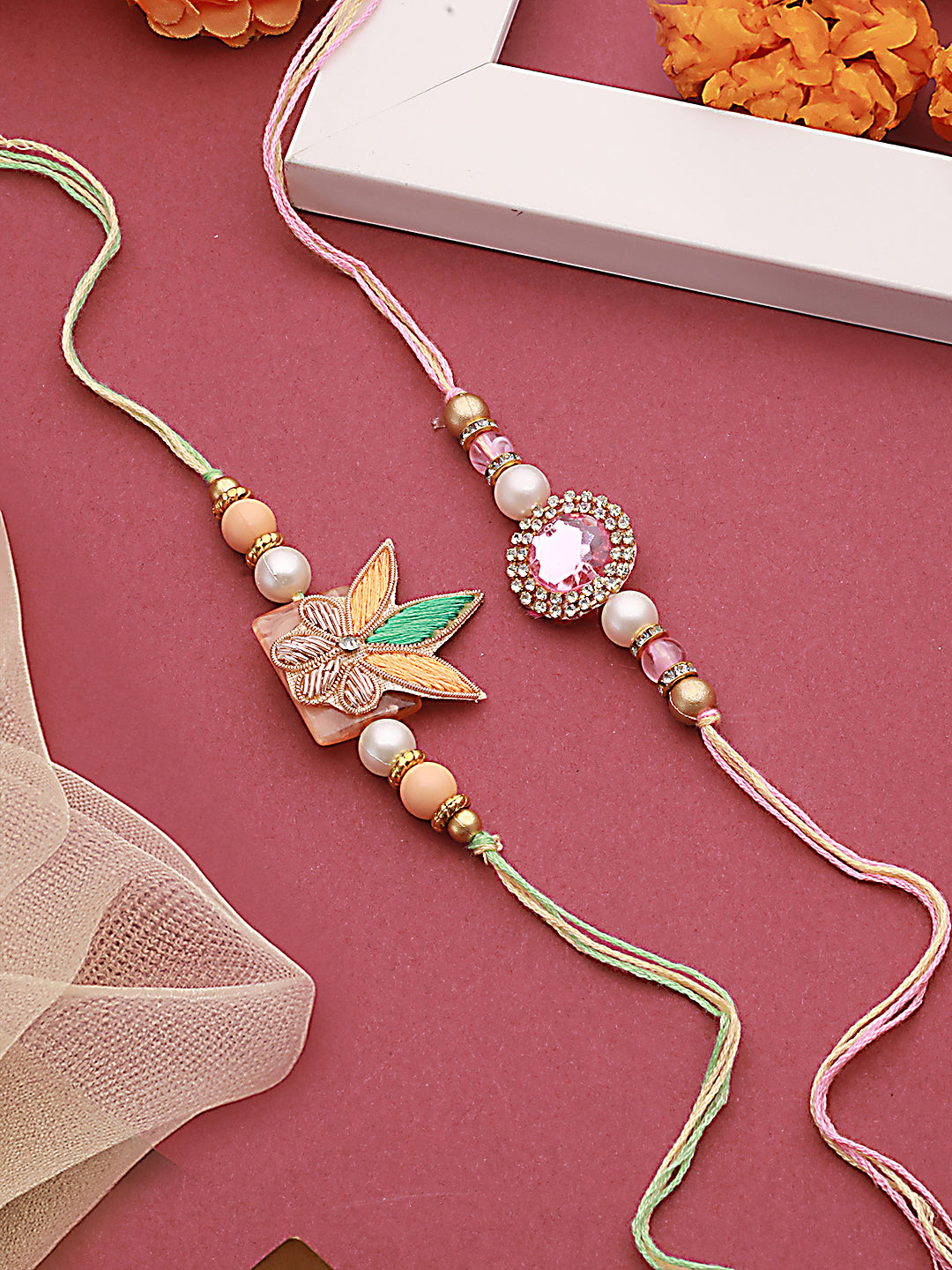 Jazz And Sizzle Unisex Set Of 2 Stone Studded & Floral Rakhi With Roli & Chawal