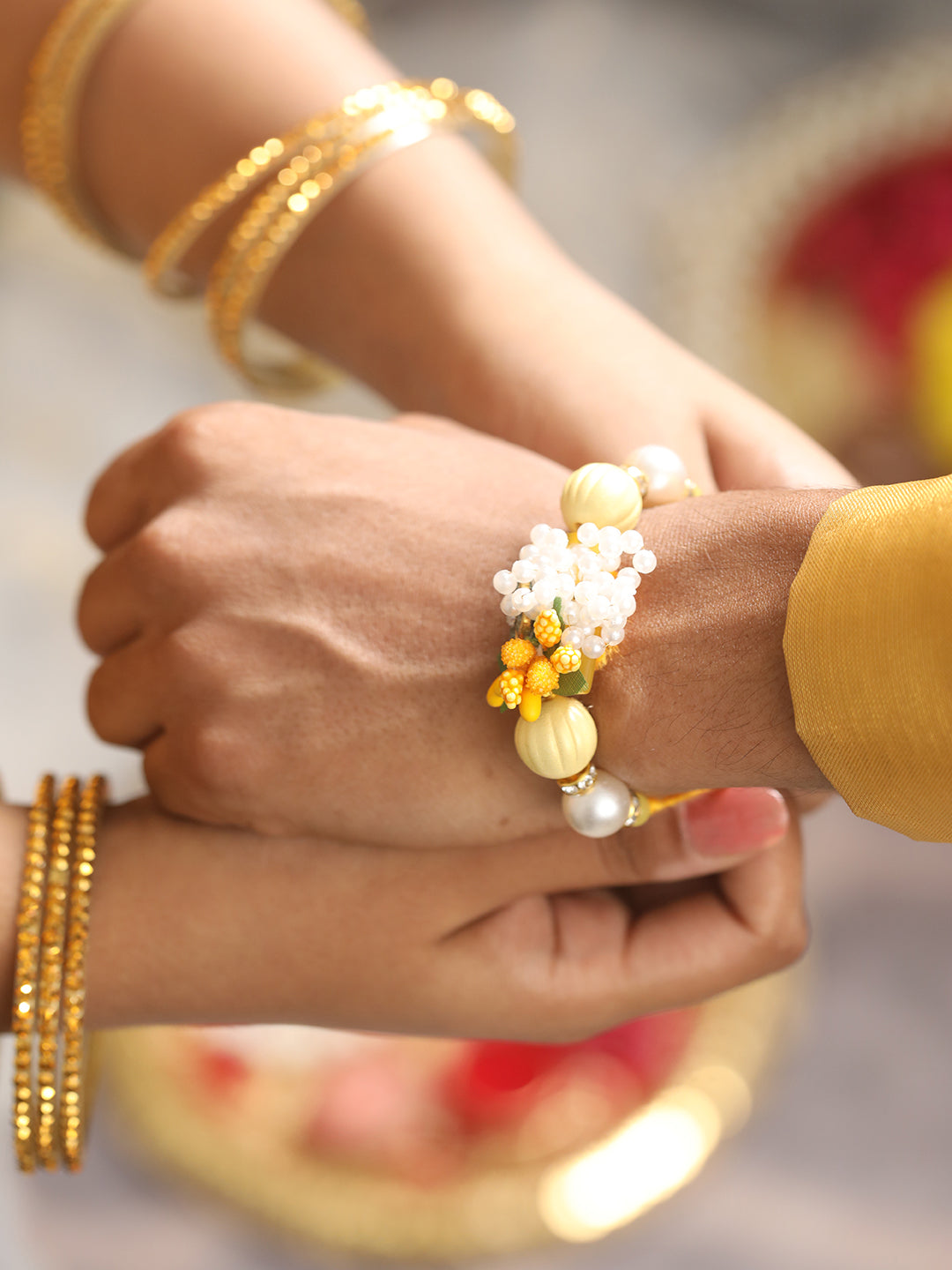 Jazz And Sizzle Unisex Set Of 2 Floral & Evil Eye Rakhi With Roli & Chawal