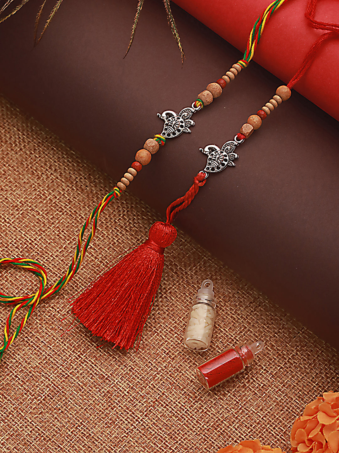 Jazz And Sizzle Set Of 2 Peacock Shaped Bhaiya Bhabhi Tasseled Rakhi