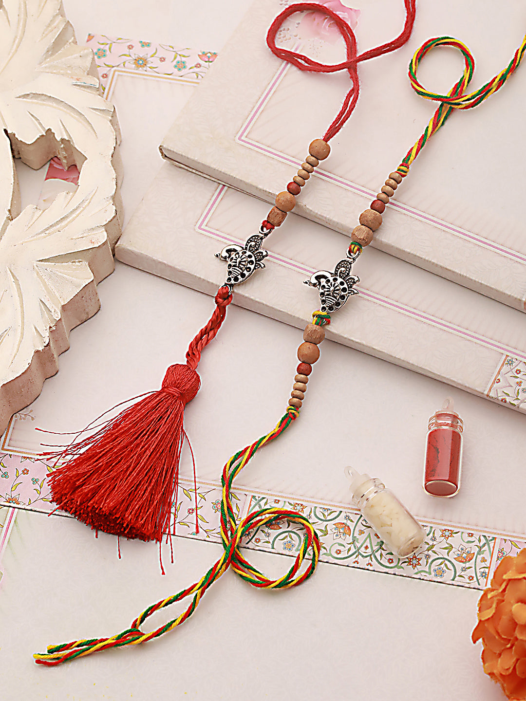 Jazz And Sizzle Set Of 2 Peacock Shaped Bhaiya Bhabhi Tasseled Rakhi