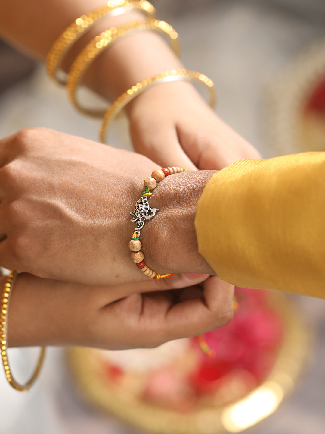 Set Of 2 Peacock Shaped Bhaiya Bhabhi Tasselled Rakhi With Roli & Chawal