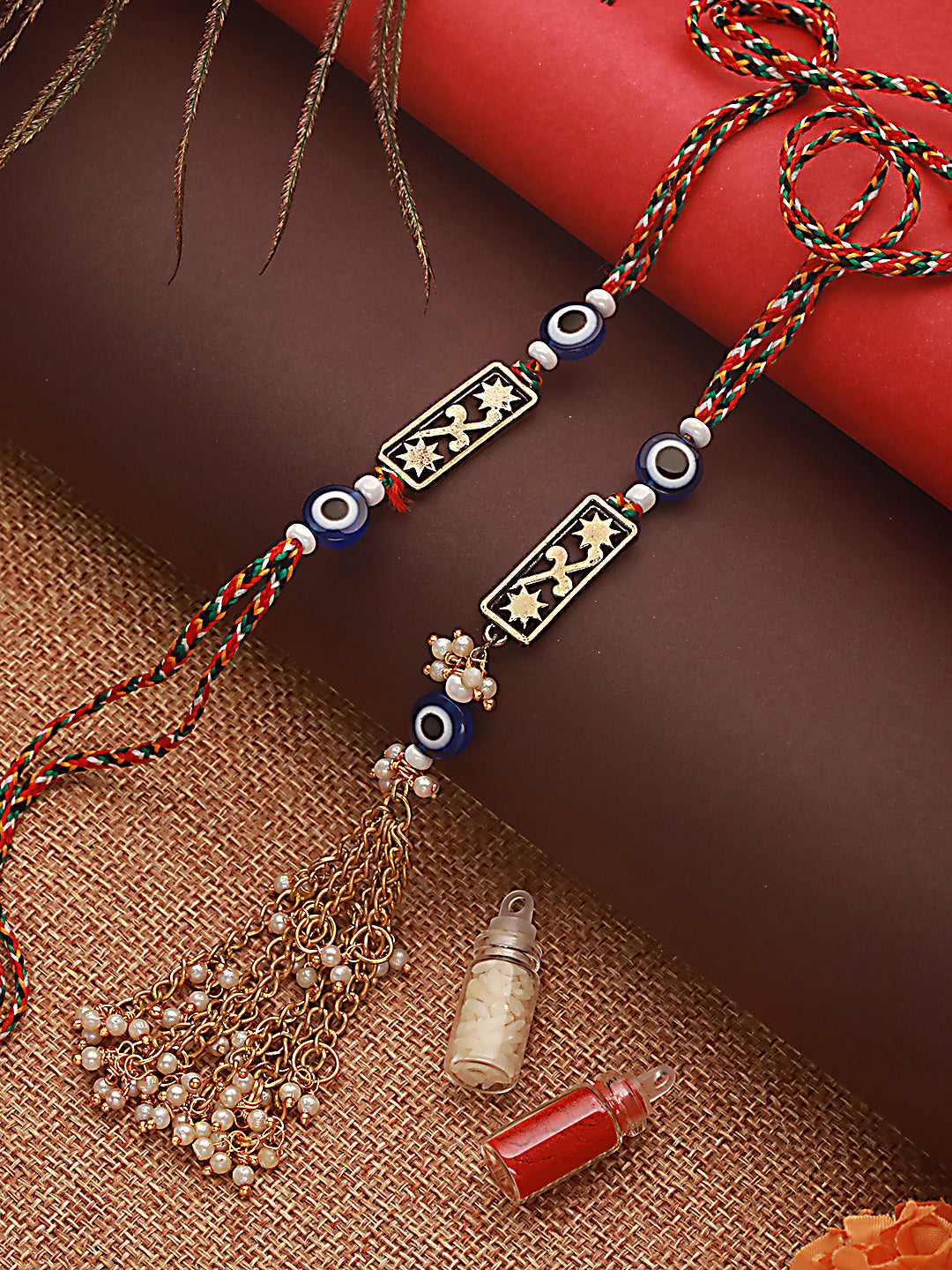 Jazz And Sizzle Set Of 2 Evil Eye & Floral Motif Bhaiya Bhabhi Tasseled Rakhi