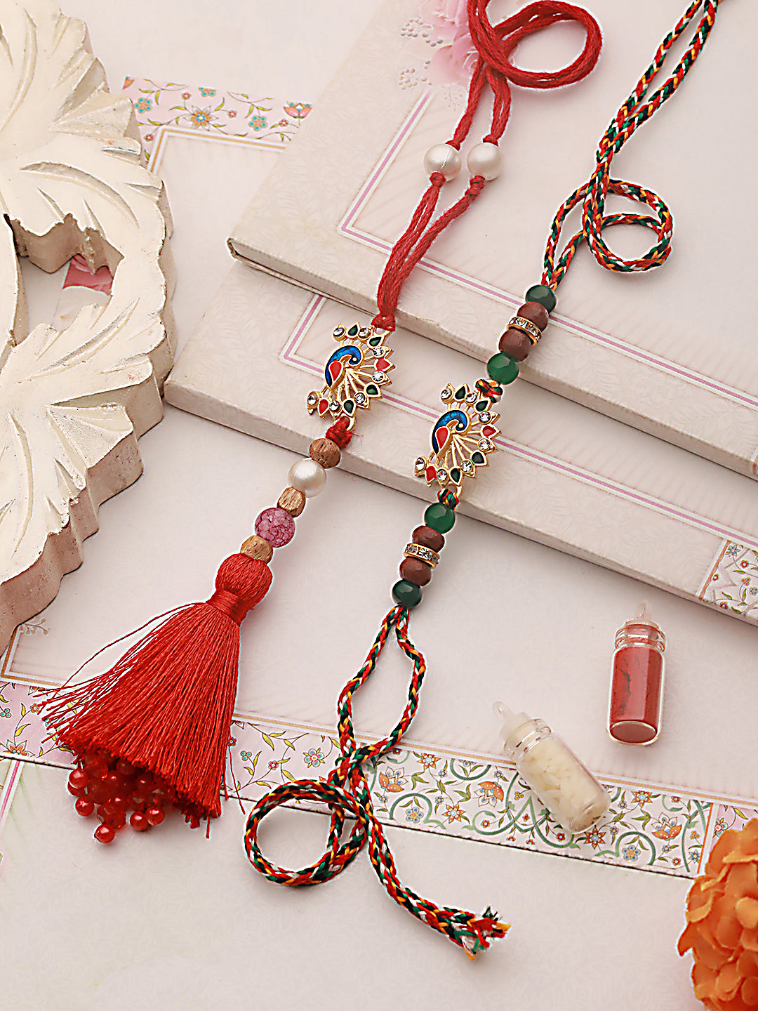 Jazz And Sizzle Set Of 2 Peacock Shaped Bhaiya Bhabhi Tasseled Rakhi