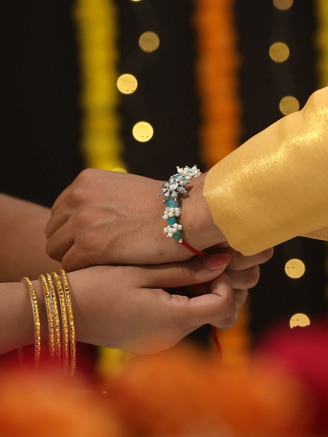 Jazz and Sizzle Set Of 2 Swastik Motif & Mogra Beaded Bhaiya Bhabhi Tasseled Rakhi