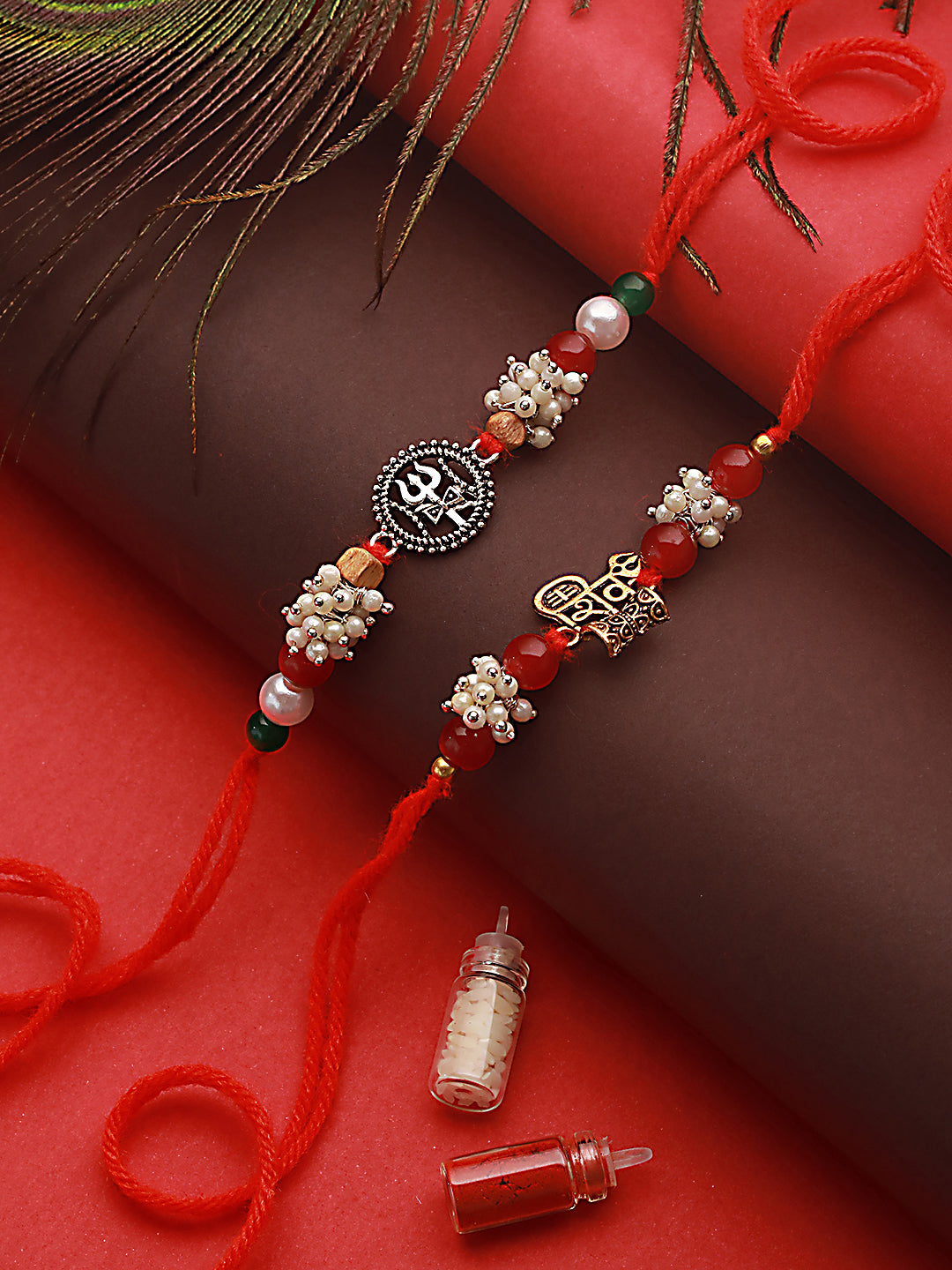 Jazz And Sizzle Set Of 2 Trishul & Shiva Dumroo Mogra Beaded Rakhi