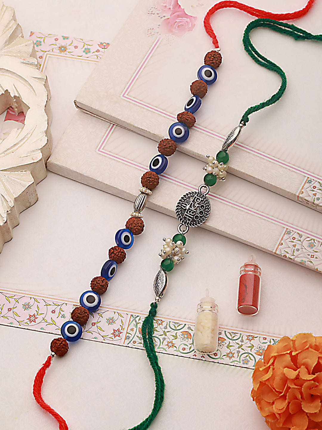 Jazz And Sizzle Set Of 2 Rudraksh Evil Eye & Mahadev Rakhi With Roli & Chawal
