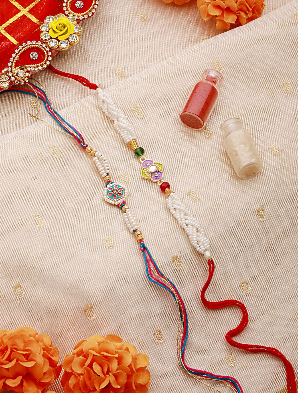 Jazz And Sizzle Set Of 2 Pearl Beaded & Minakari Work Thread Rakhi With Roli & Chawal