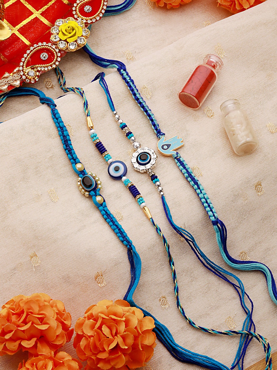 Set Of 4 Intricate Macrame & Faux Pearl Beaded Evil-Eye Rakhi With Roli & Chawal