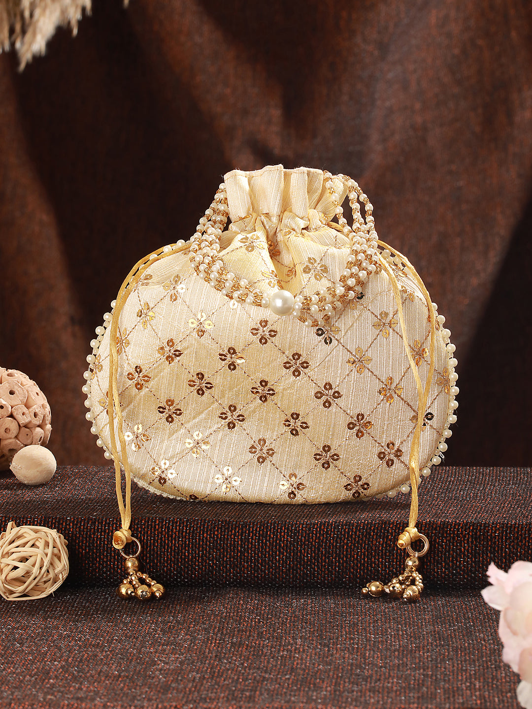 Gold-Coloured & Gold-Toned Embellished Potli Clutch - Jazzandsizzle