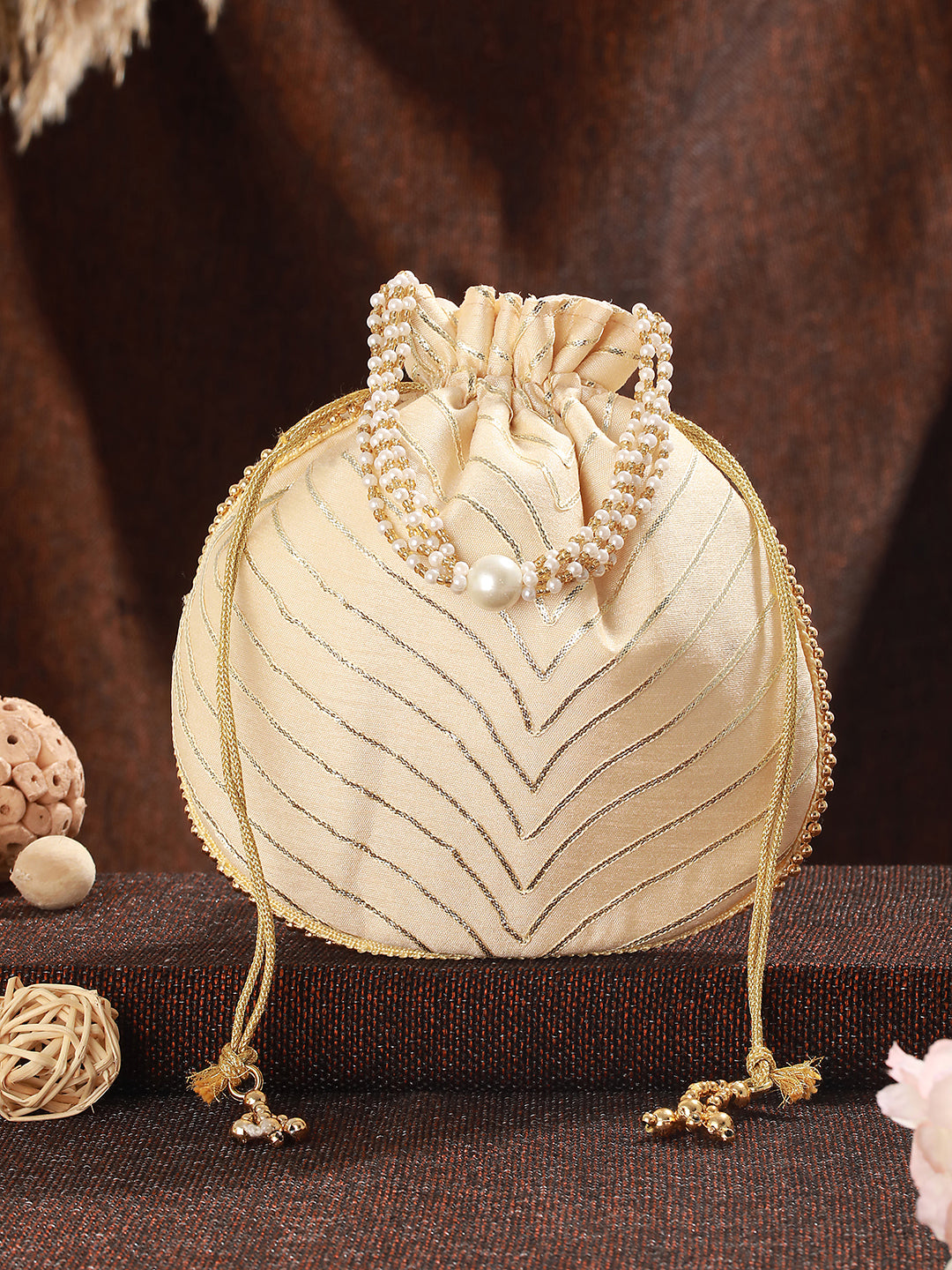 Jazz And Sizzle Gold Embellished Potli Clutch with Pearl Beaded Handle & Drawstrings - Jazzandsizzle
