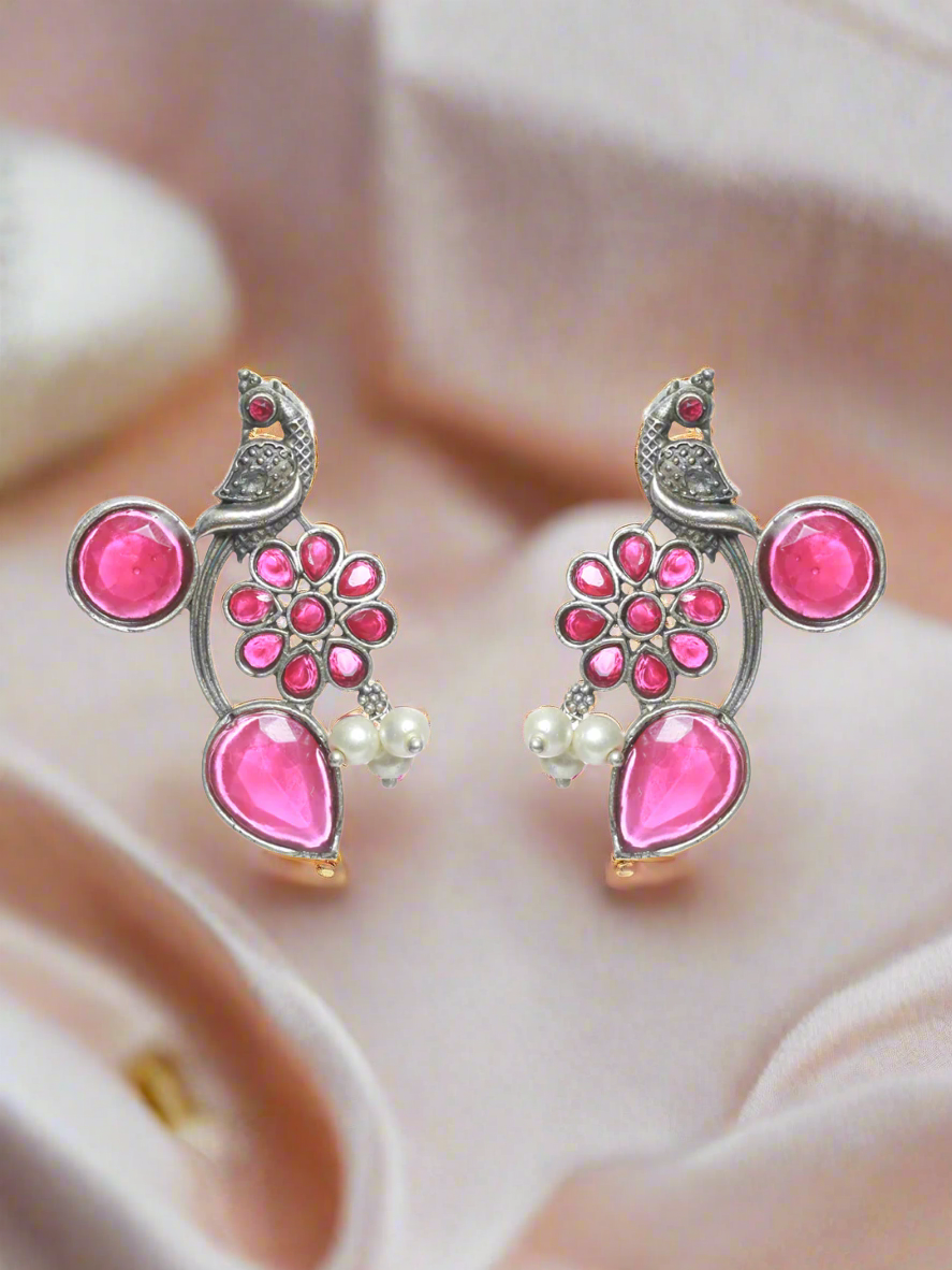 Silver Toned Oxidised-Pink Stone Studded Contemporary Peacock Shaped Drop Earrings