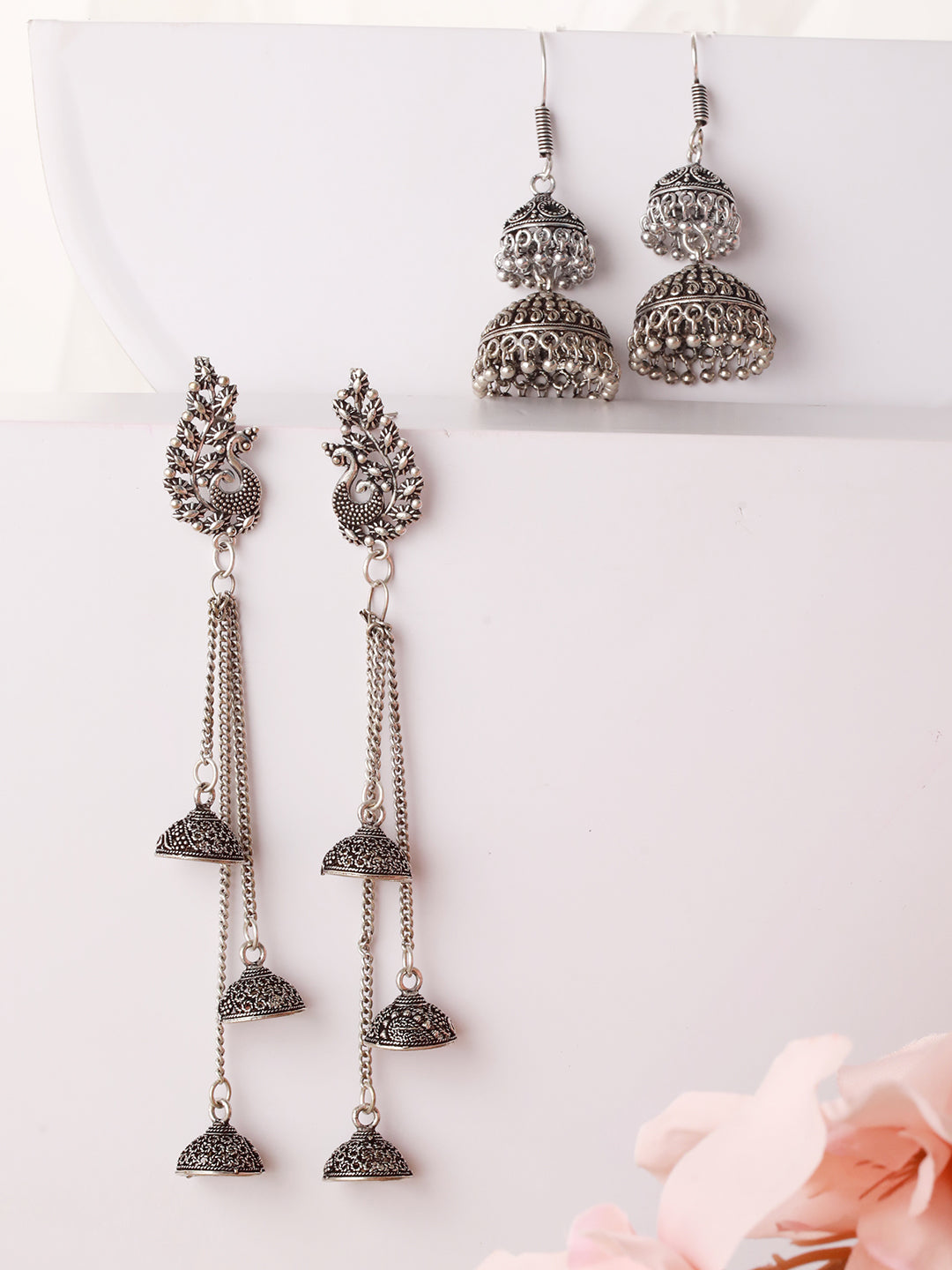 Set Of 2 Silver Plated Peacock Shaped Jhumka Earrings - Jazzandsizzle