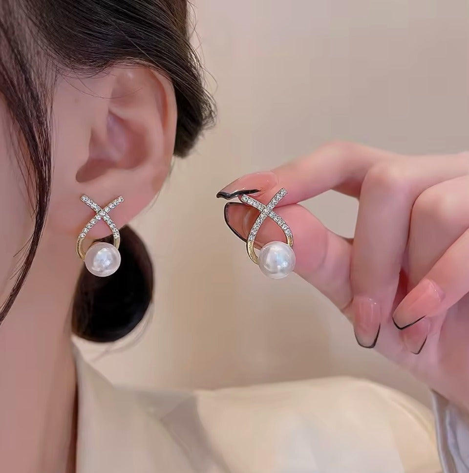 Elegant Pearl Drop Earrings with Gold-Tone Crystal X Design
