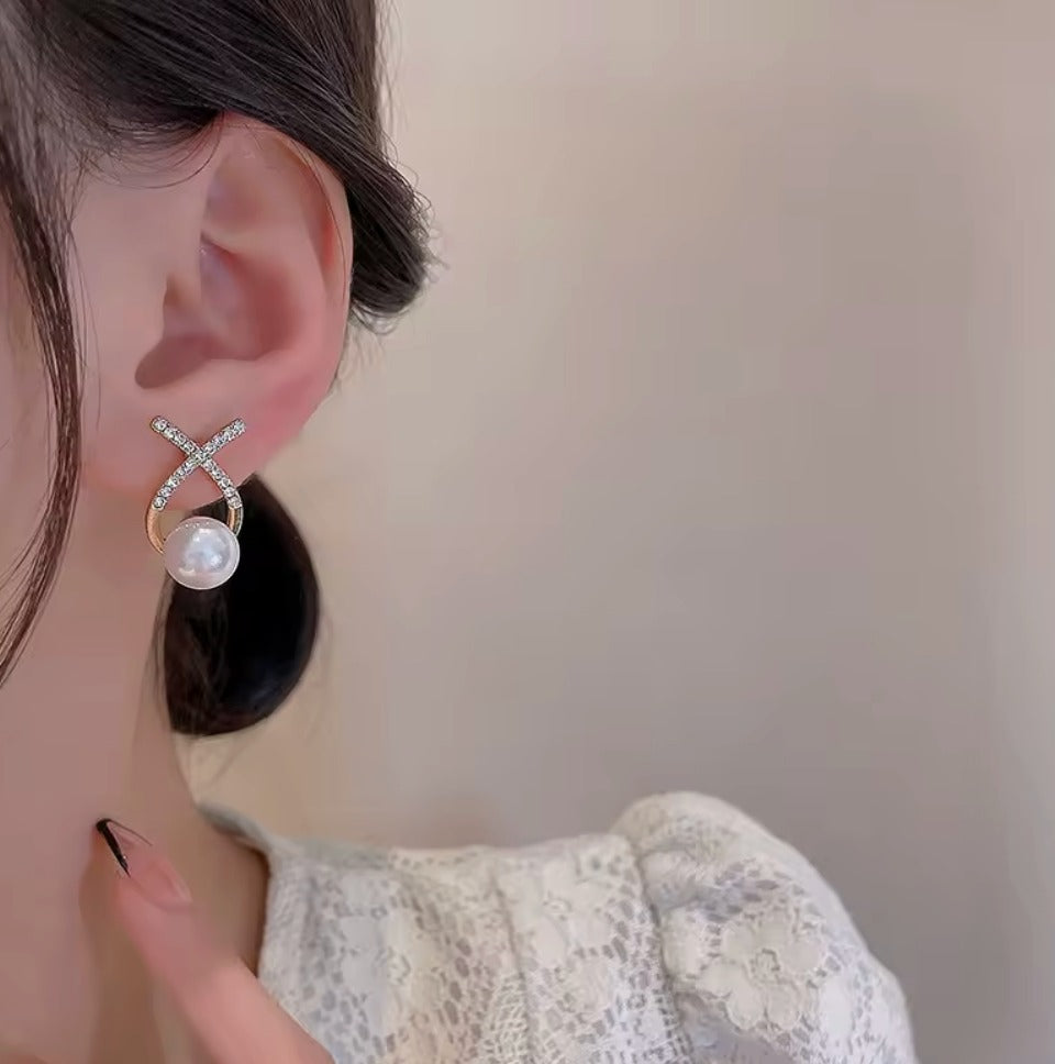 Elegant Pearl Drop Earrings with Gold-Tone Crystal X Design