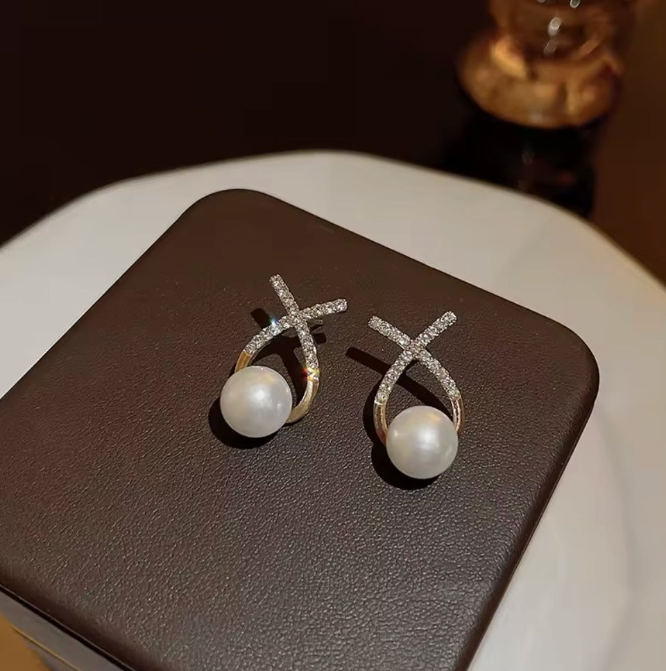 Elegant Pearl Drop Earrings with Gold-Tone Crystal X Design