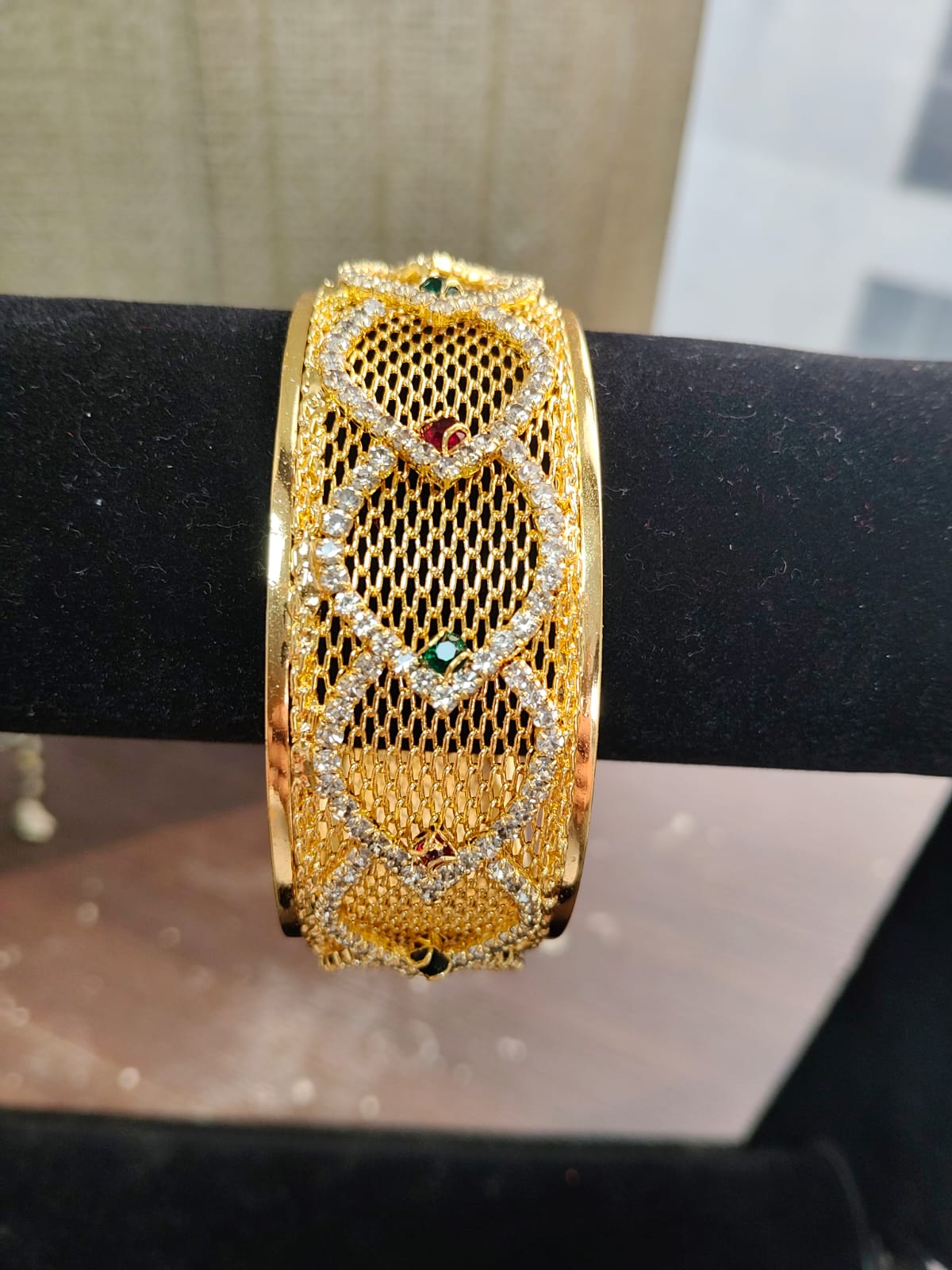 Jazz And Sizzle Gold Plated Artificial Stone Studded & Pearl Beaded Bangles