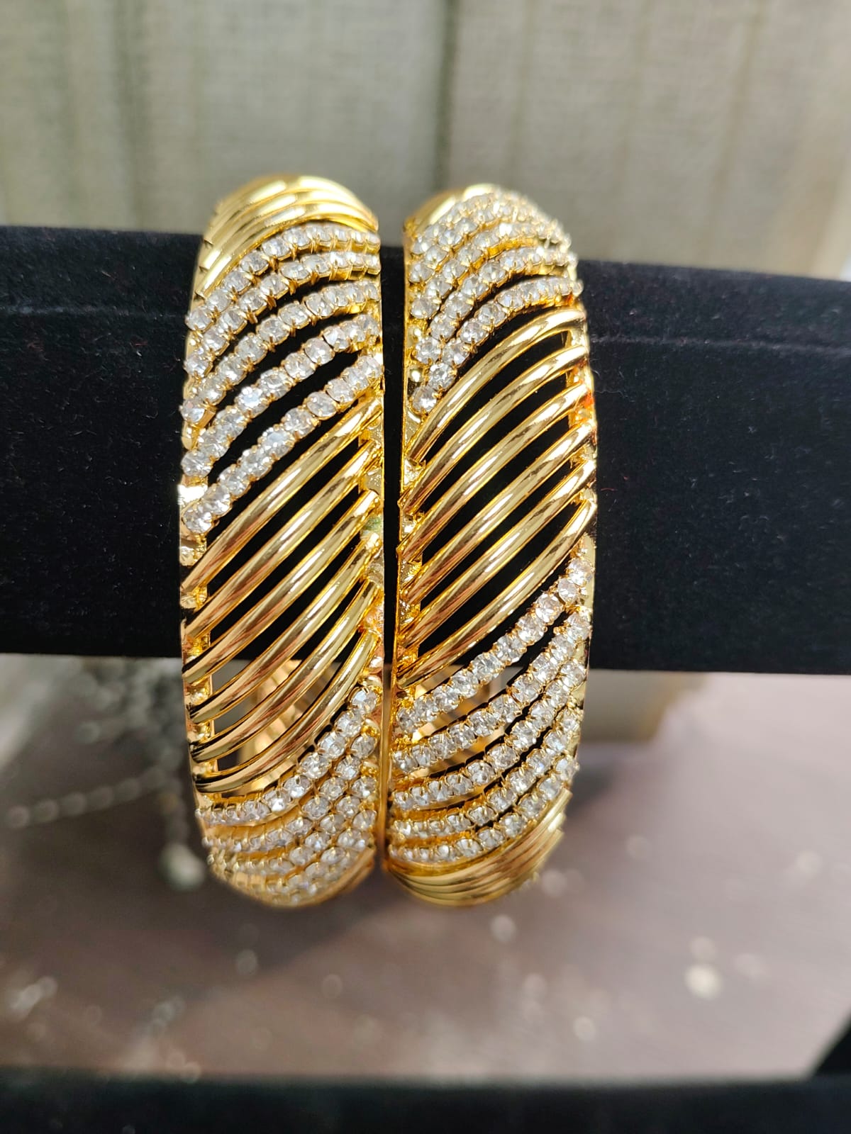 Jazz And Sizzle Set Of 2 Gold Plated Artificial Stone Studded & Pearl Beaded Bangles