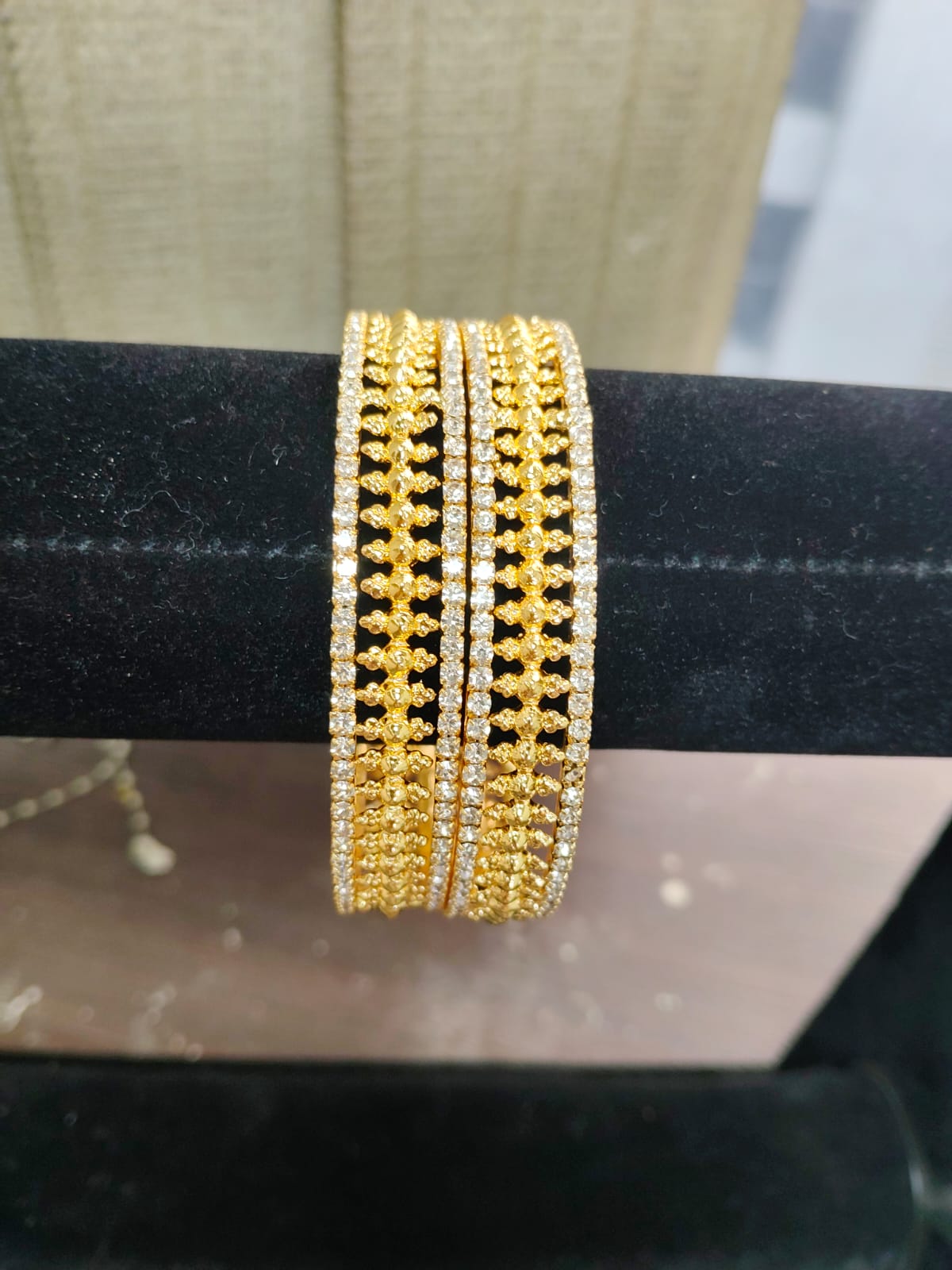 Jazz And Sizzle Set Of 2 Gold Plated Artificial Stone Studded & Pearl Beaded Bangles