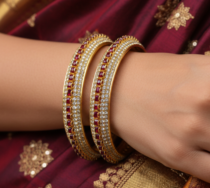 Jazz And Sizzle Set Of 2 Gold Plated Cubic Zirconia Studded & Ruby Red Stone Beaded Bangles