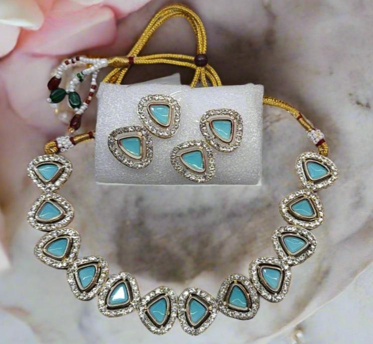 Jazz And Sizzle Traditional Polki & Sky Blue Kundan Studded Gold Plated Jewelry Set