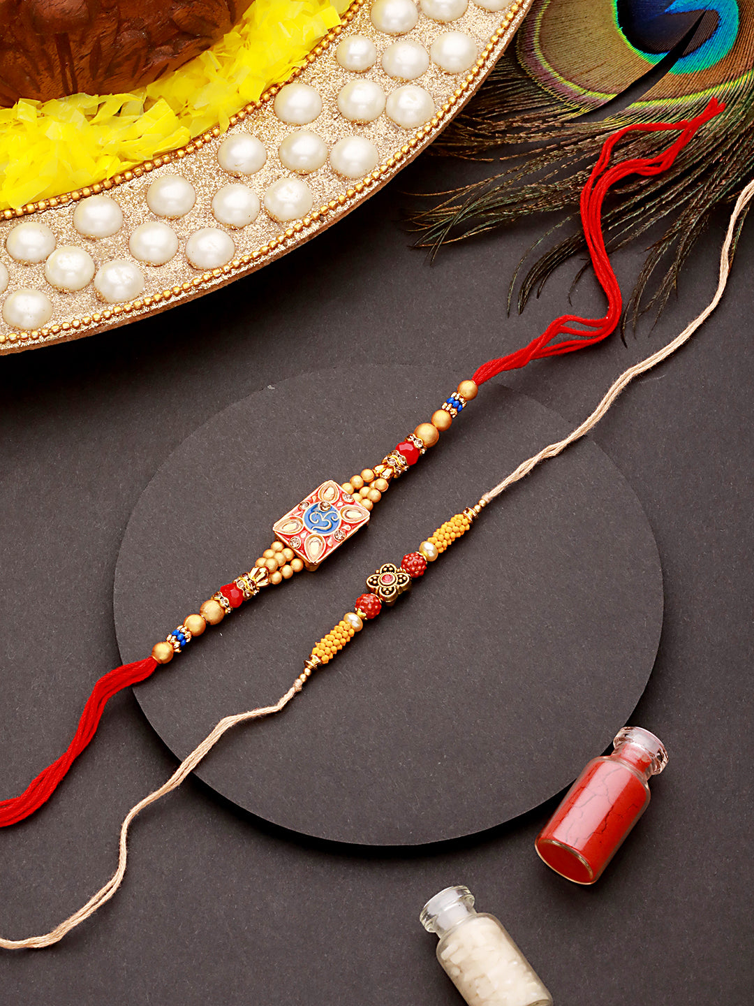Jazz And Sizzle Set Of 2 Om & Rudraksh Spiritual Thread Rakhi With Roli Chawal