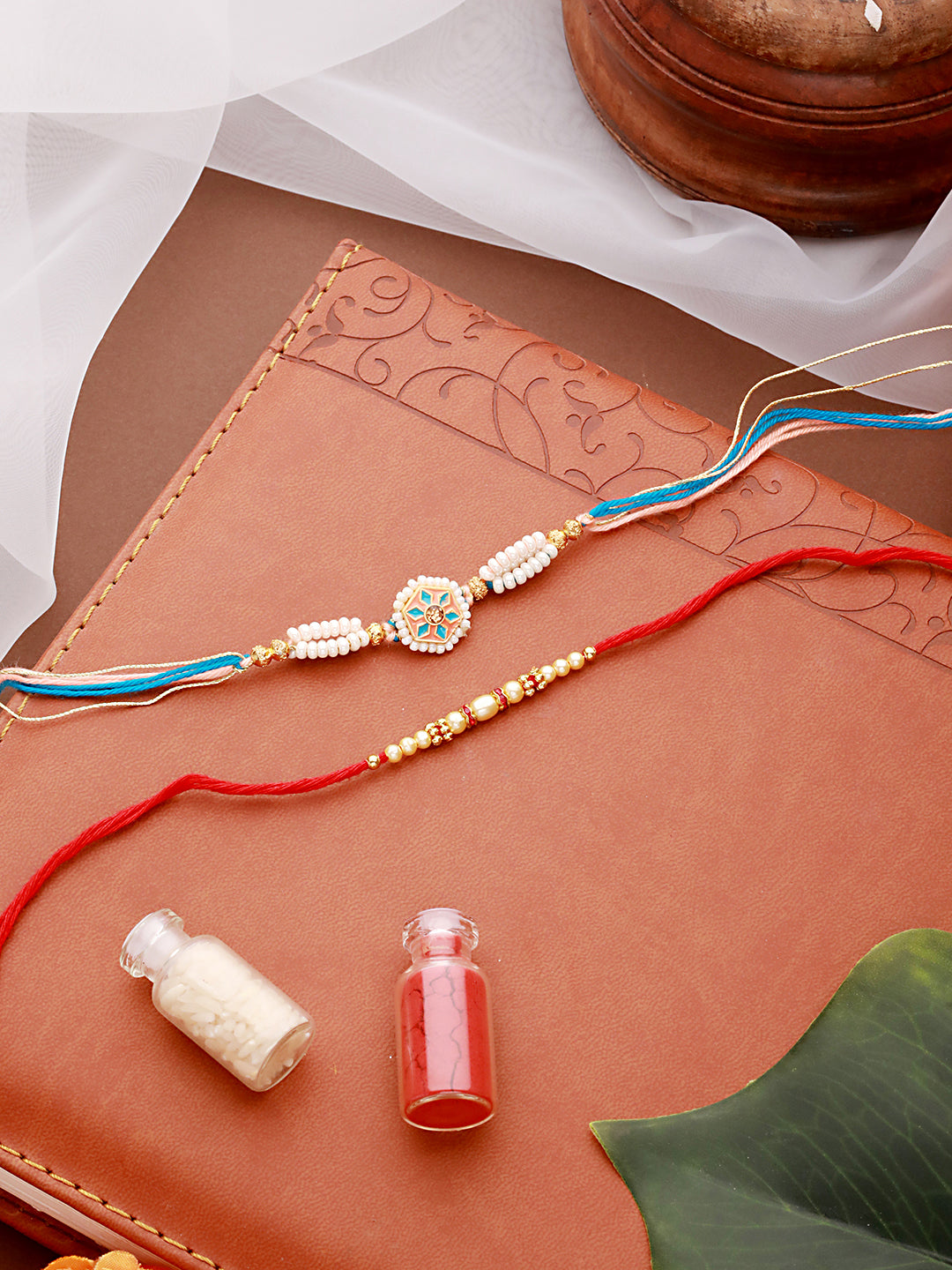 Jazz And Sizzle Set Of 2 White Faux Pearls Beaded & Enameled Thread Rakhi