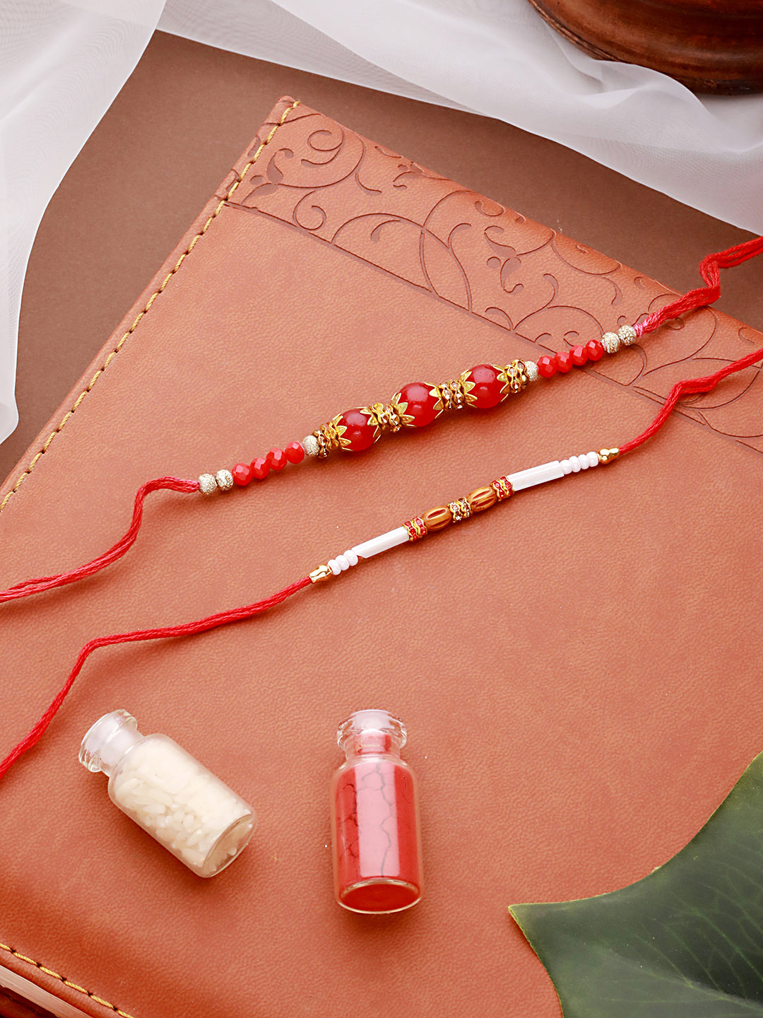 Set Of 2 Maroon & White Pearl Beaded Thread Rakhi With Roli Chawal