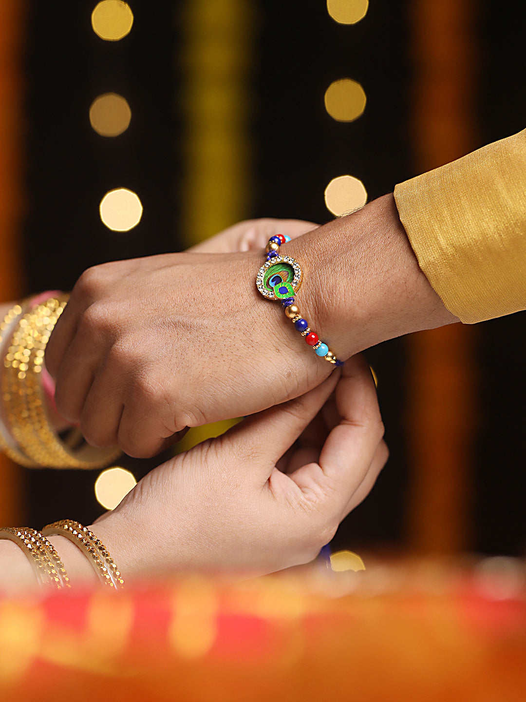 Jazz And Sizzle Set Of 2 Yellow Pearl Beaded & Blue Morpankh Enameled Designer Rakhi