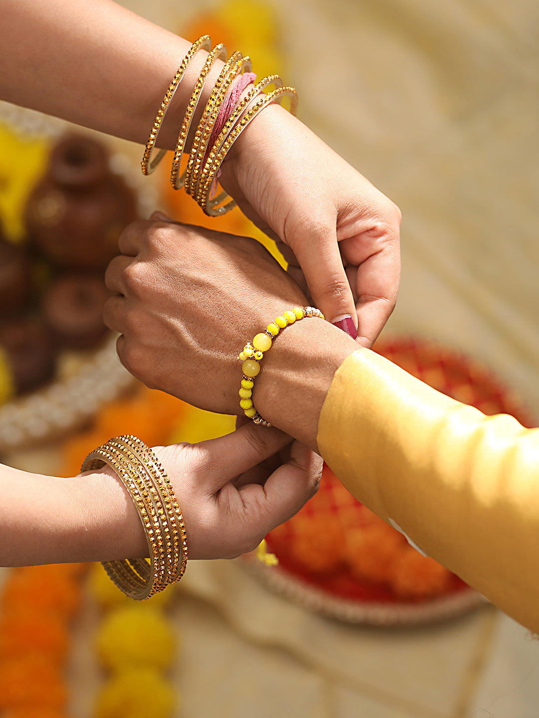 Jazz And Sizzle Set Of 2 Yellow Pearl Beaded & Blue Morpankh Enameled Designer Rakhi