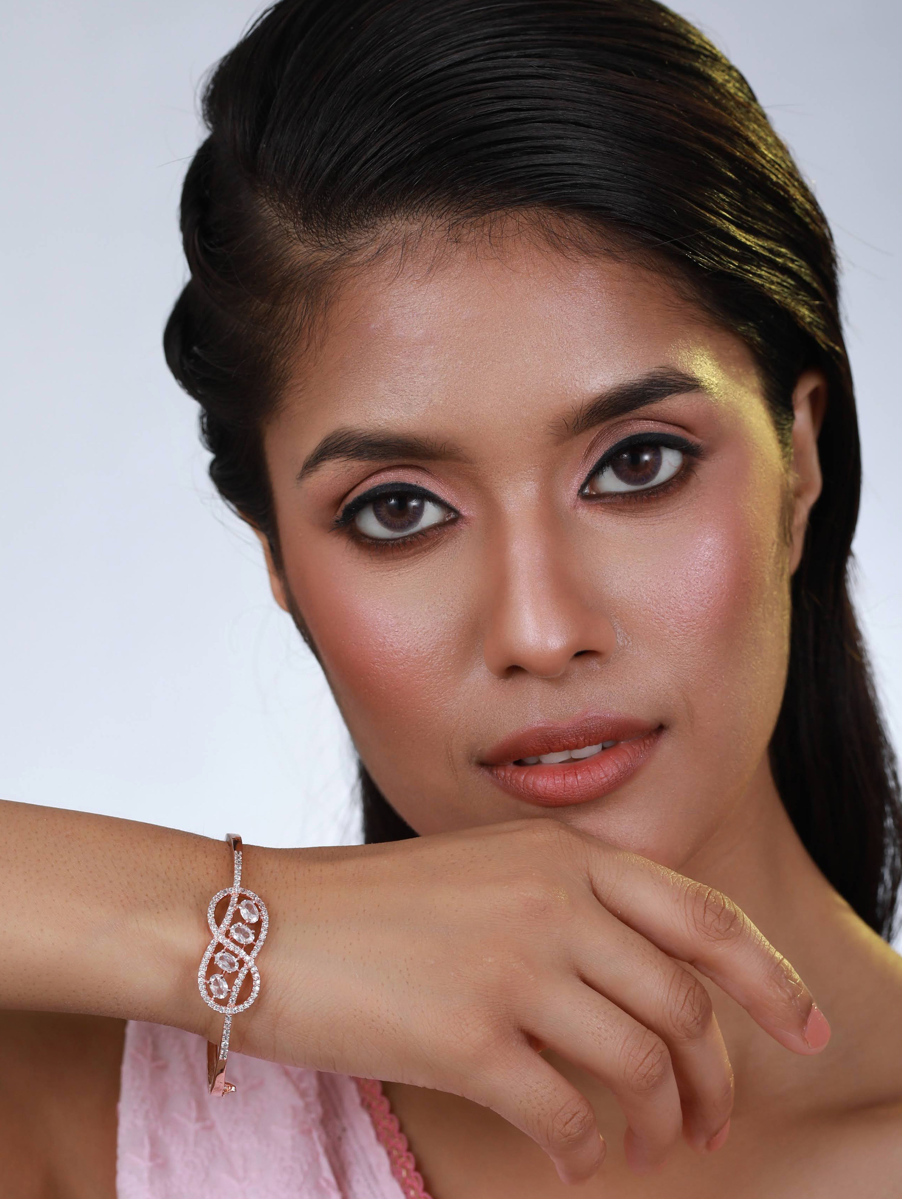 Rose Gold Plated White American Diamond Studded Handcrafted Infinity Shaped Bangle-Style Bracelet - Jazzandsizzle