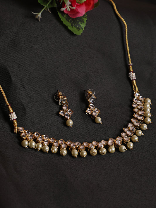 Gold-Toned & White Contemporary Kundan Studded & Pearl Beaded Jewellery Set - Jazzandsizzle